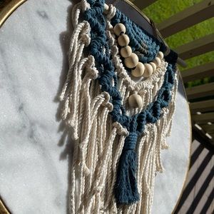 Handmade using natural cotton cord.